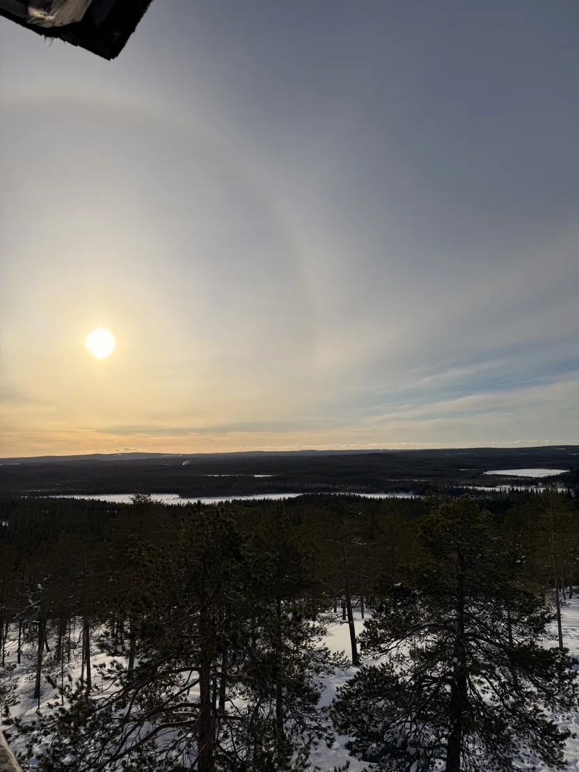 Panoramic view over snow-covered Lapland from the Taiga viewpoint tower
